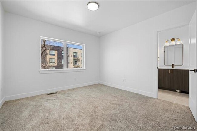 Building Photo - Modern 3-Story Townhomes with Private Yard...