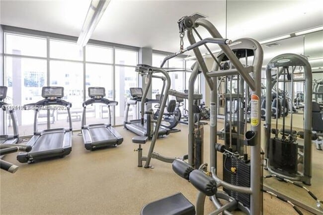 Building Photo - 10275 Collins Ave