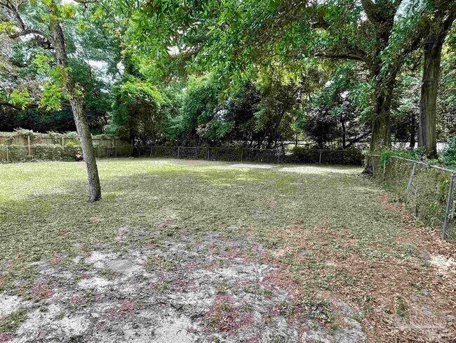 Building Photo - 6975 Woodley Dr