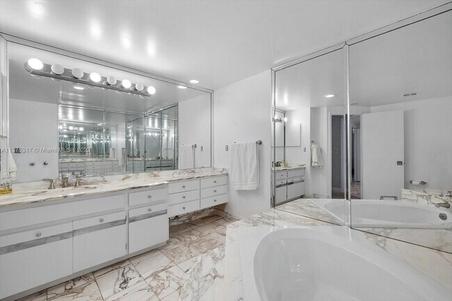 Building Photo - 10155 Collins Ave