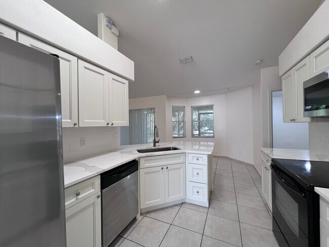 Building Photo - PRICE REDUCED FOR A QUICK MOVE IN!!  Beaut...