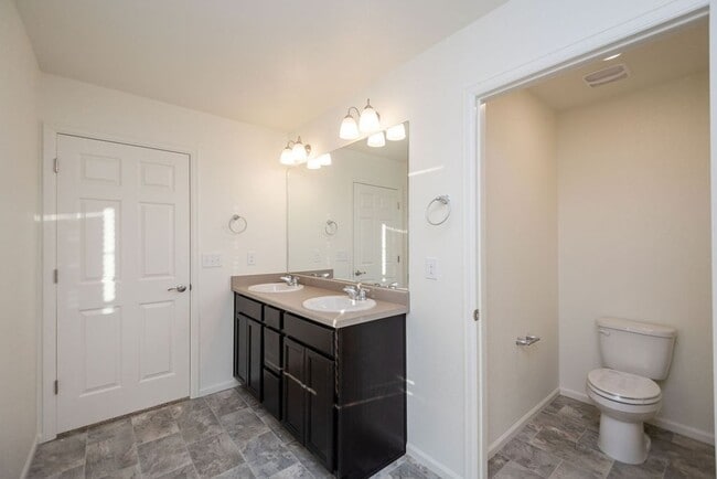 Building Photo - Spacious 4-Bedroom Home with 3-Car Garage & Walk-Out Basement | Prime Living Opportunity