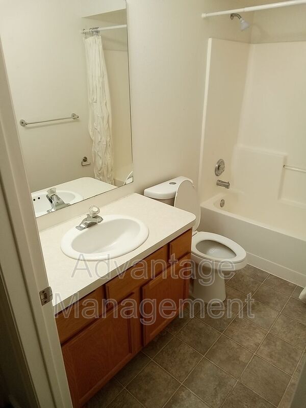 Building Photo - 8083 N Ridge Loop E