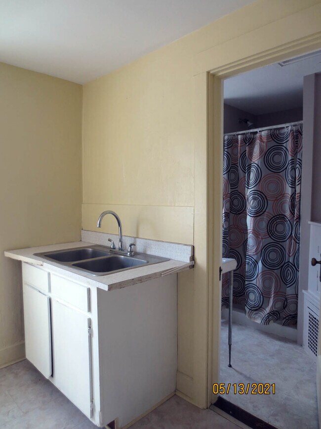 Kitchen into bathroom - 1 Page St