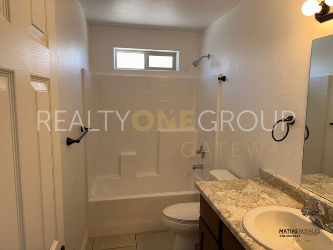 Building Photo - Three Bedroom Two Bath Home with All Tile ...