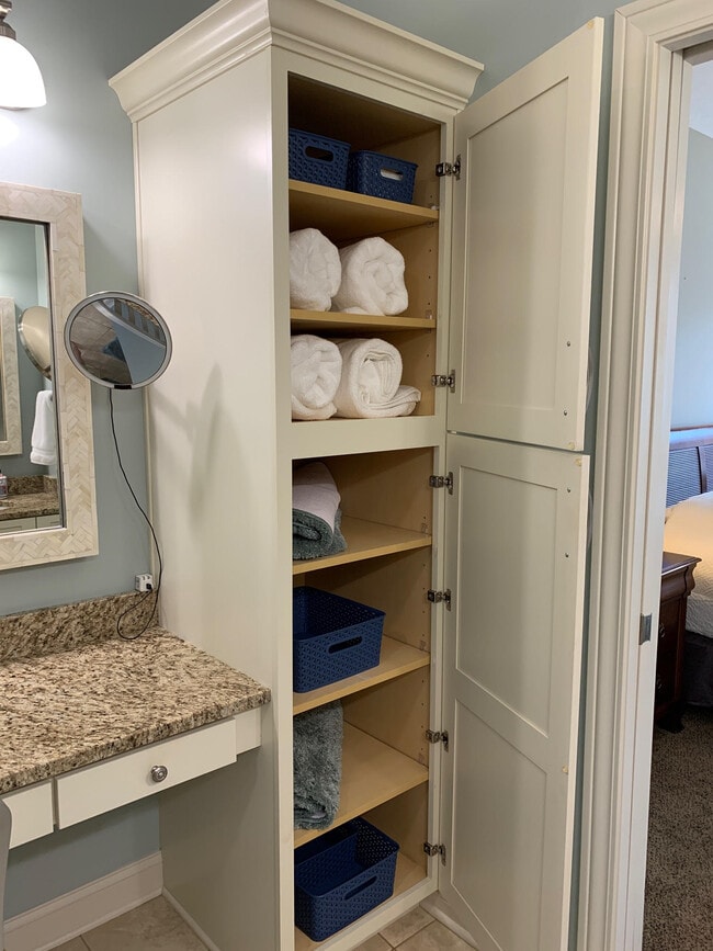 Linen closet storage - 532 Beachcliff Row Dr