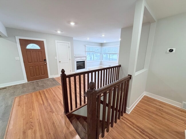 Building Photo - Spacious 4-Bedroom Home with Pond Views & EV-Ready Garage – Bloomington!!