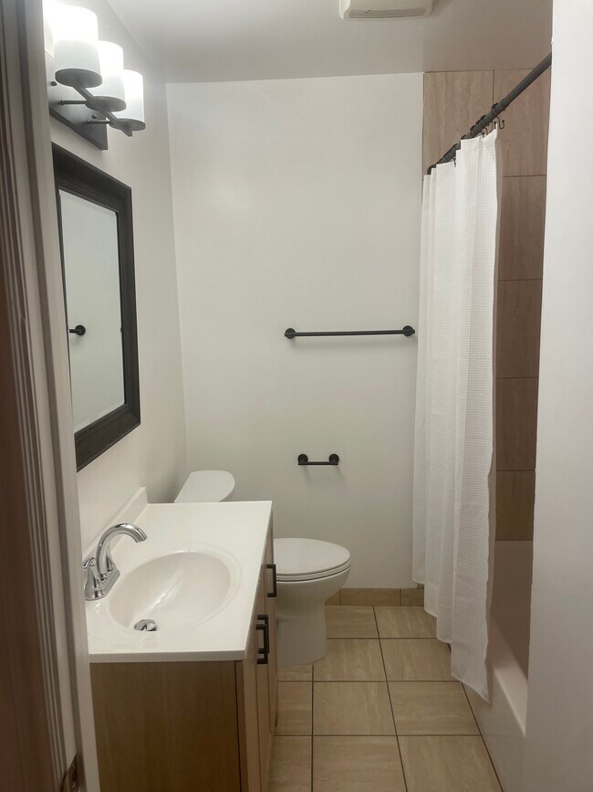 remodeled hallway bathroom - 19406 Archwood St