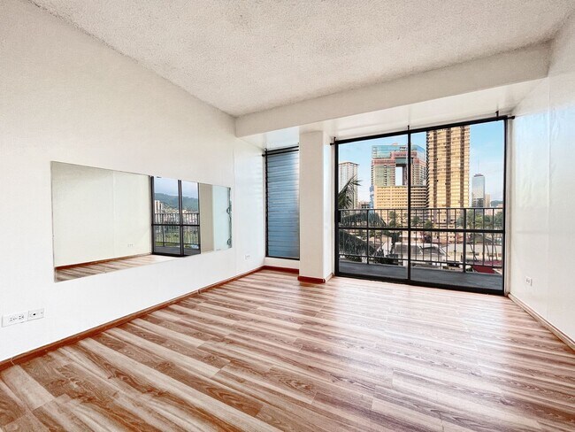 Building Photo - Versatile Waikiki 2-Bedroom, 2-Bath Condo with 1 Parking