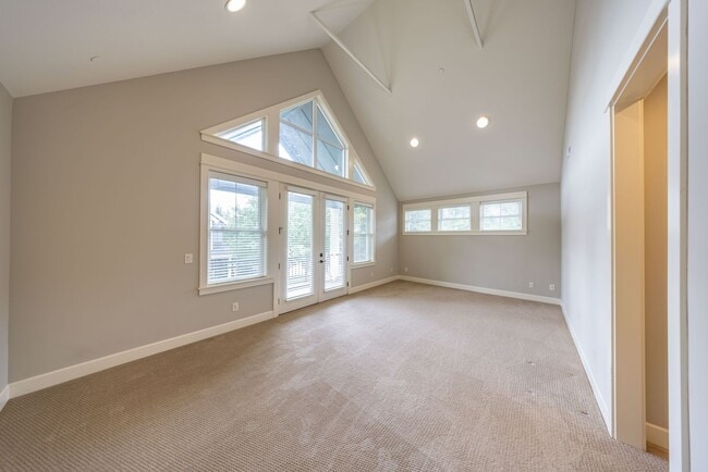 Building Photo - 2 Creeks Condominiums - Gated Community on...