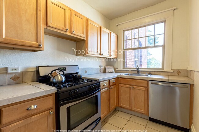 Building Photo - Urban Elegance in Irving Street Towers – W...