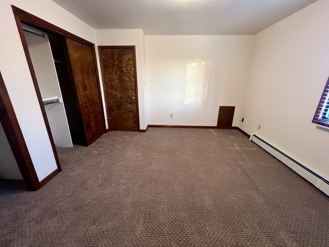 Building Photo - "Cozy 2-Bed Condo with Fireplace Oasis in ...