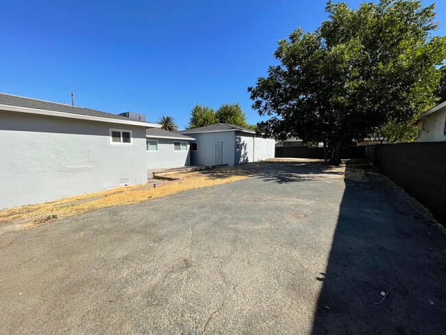 Building Photo - Huge yard with 4 car garage! Newly Remodel...