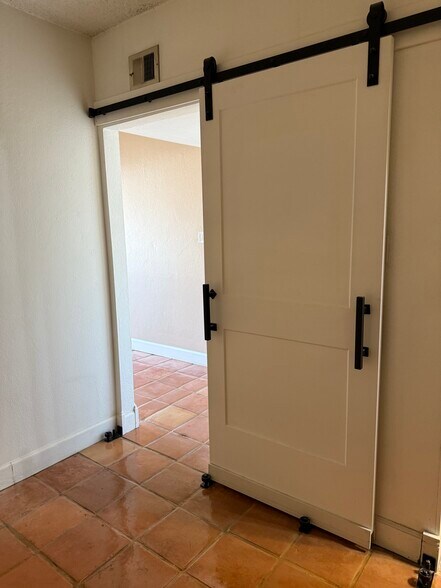Barn door to separate the dressing room from the master bedroom - 349 E Thomas Rd