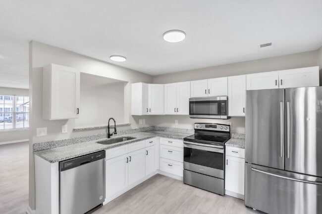 Building Photo - 2 Bedroom, 1.5 Bathroom Townhome – Granite Counters & Open Floor Plan $1400/mo rent