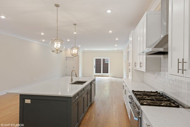 Building Photo - Condo Quality 3,400 SF Duplex Down in Roscoe Village, Pet Friendly Available August 1st