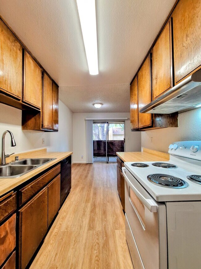 Building Photo - Beautiful 2bd Condo In Gated Community With Pool, Gym, and On-site Laundry