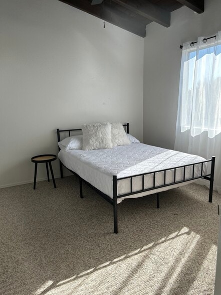 Front bedroom with Full Size bed and large closet space - 440 N Dodge Blvd