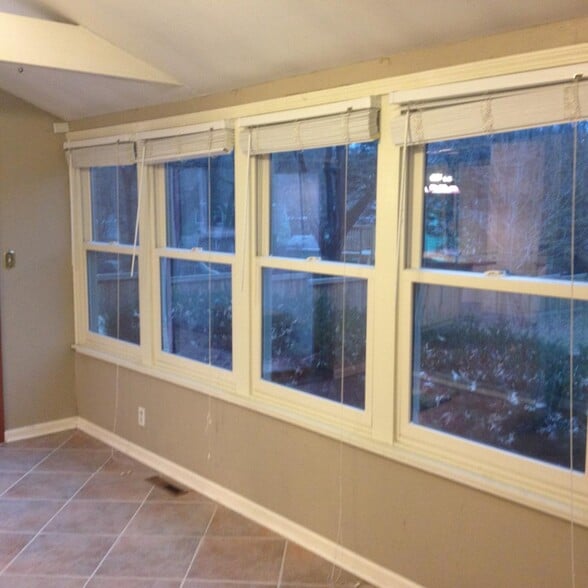 Sunroom looks out to backyard - 4515 West 72nd Terrace