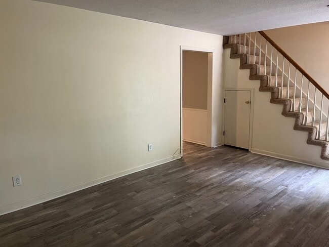 LR with stairs shown - 263 Robin Ln NW