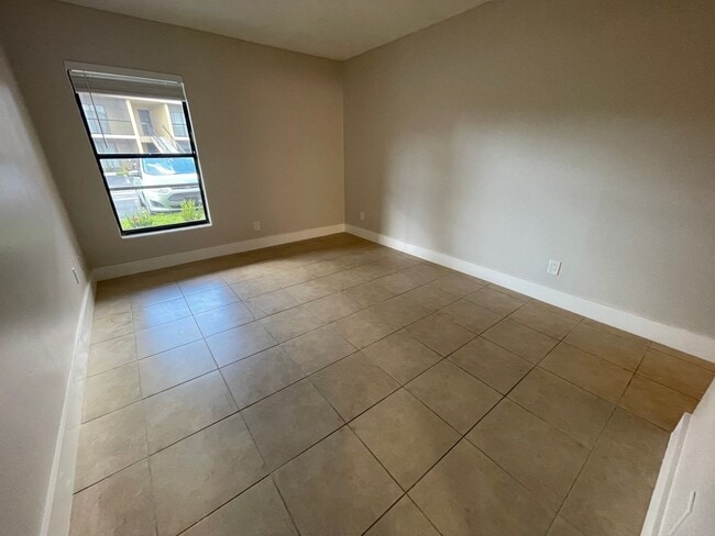 Building Photo - ANNUAL RENTAL - 2 BED / 2 BATH CONDO AT MYSTIC GARDENS