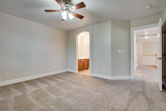 Building Photo - Spacious 3-Bedroom Home Featuring Downstai...