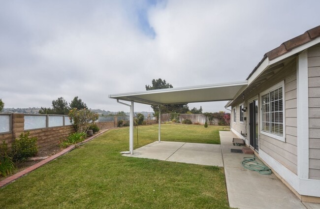 Building Photo - Lovely Single Level Home 4BR/2BTH Located ...