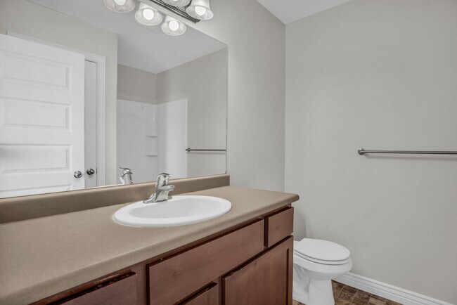 Building Photo - Spacious 4BR End-Unit Townhome | Low-Maintenance HOA Living