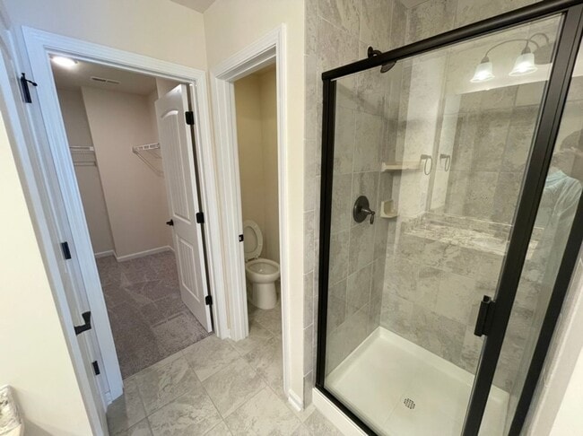 Building Photo - Like new 3 Bedroom townhouse with 2 car garage
