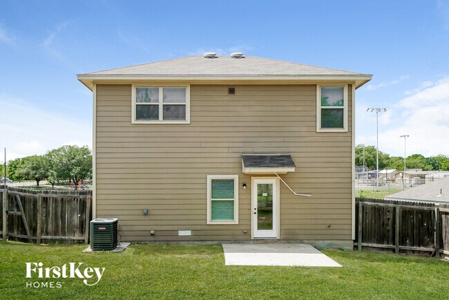 Building Photo - 6630 Woodstock Dr