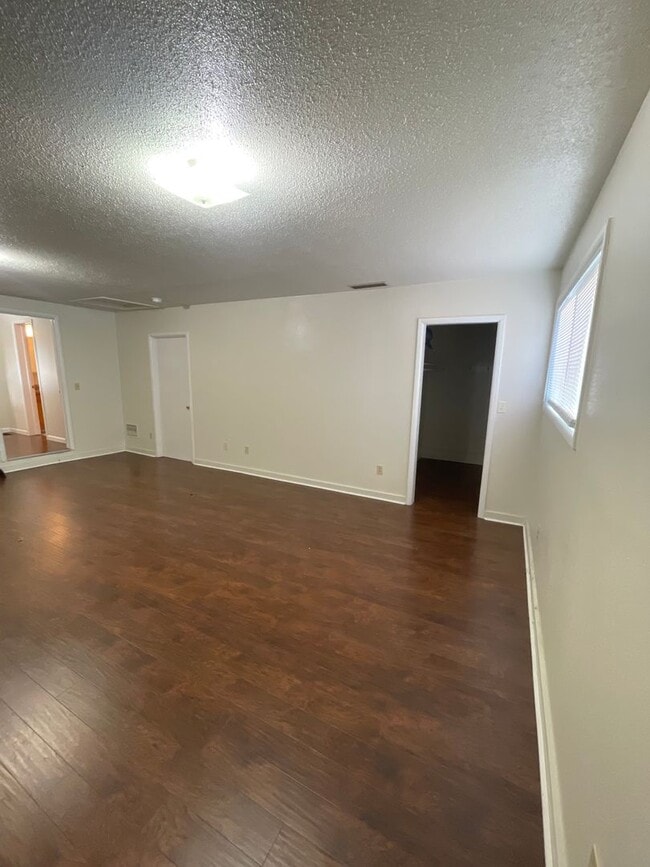 Building Photo - Newly Remodeled 4 Bedroom with a large fenced yard!