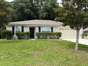 Building Photo - COMING SOON - Secret Harbor Three Bedroom Home