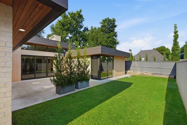 Building Photo - Experience contemporary luxury in this exceptional custom-built Midtown Tulsa residence, where so...