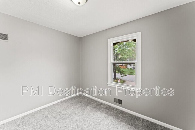 Building Photo - 12012 E 56 St