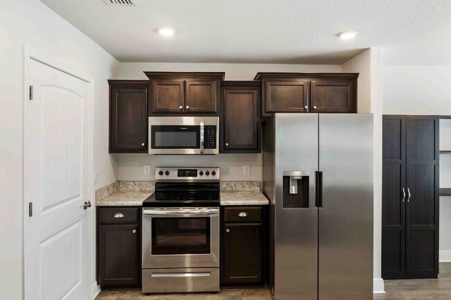 Building Photo - 3BR/2BA Two-Story Home in Cardinal Cove – Open Floor Plan, Luxury Vinyl Flooring & Oversized Prim...