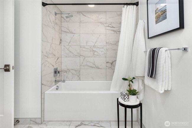 Building Photo - Seattle - Modern 1-Bedroom Condo with Stun...