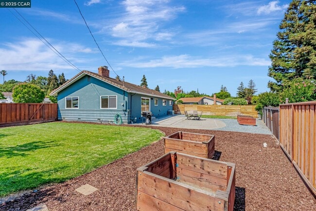Building Photo - 5891 Caulfield Dr
