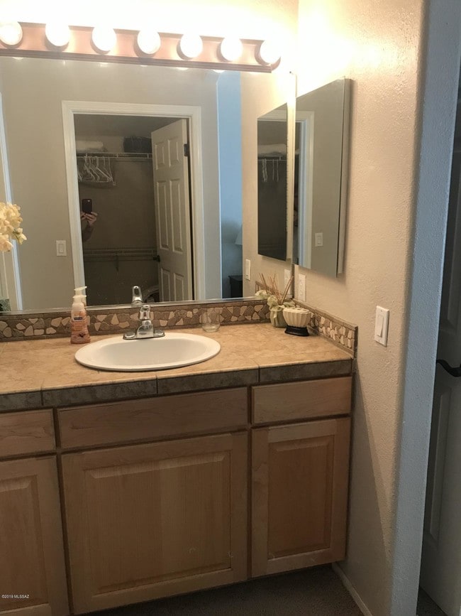 Building Photo - 7050 E Sunrise Dr