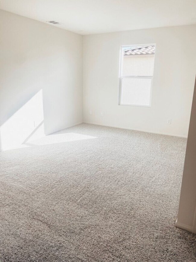 Building Photo - Beautiful Townhome in a Gated Community with 2-Car Garage!!