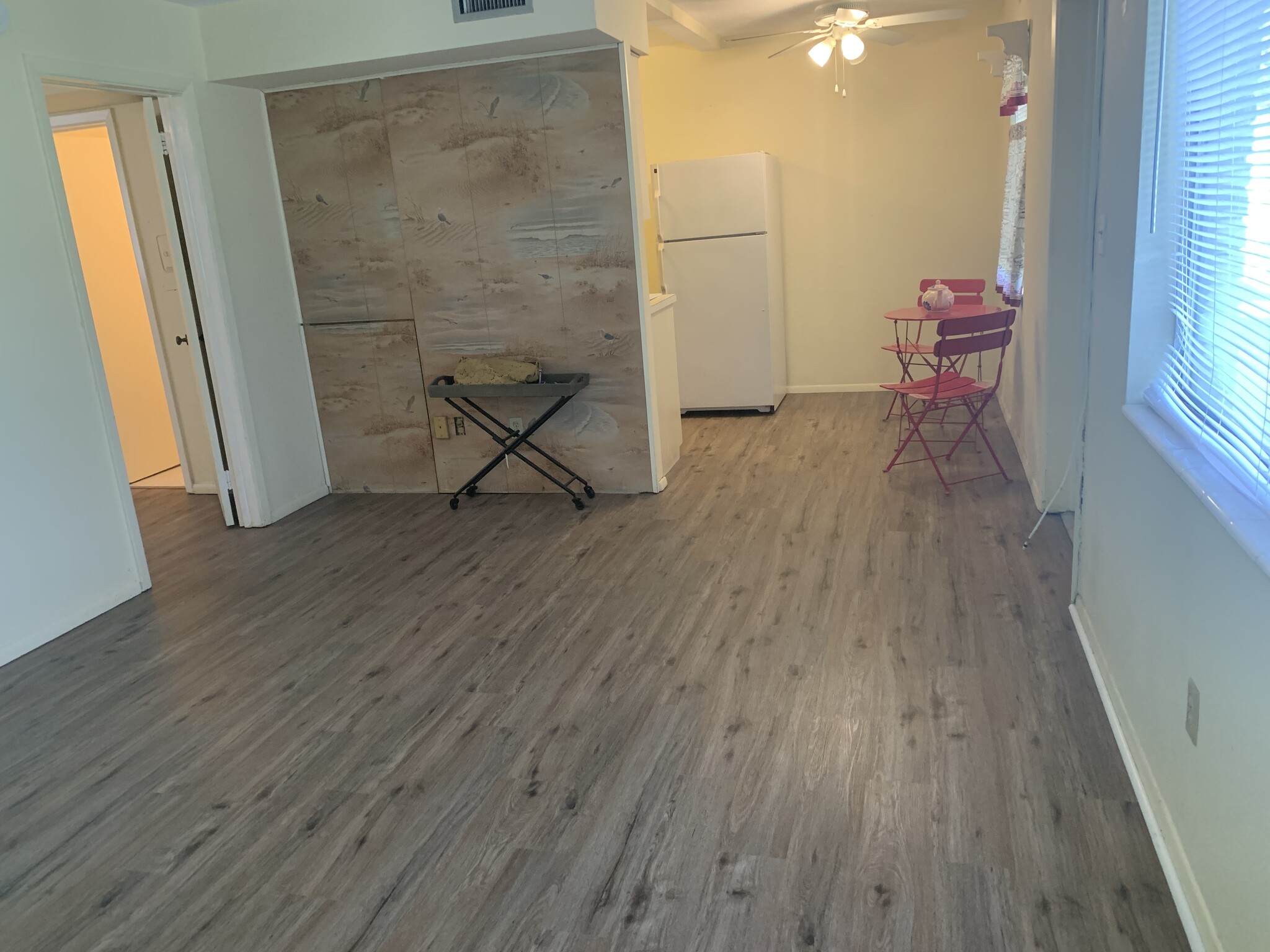 Living room and part of the kitchen new floor - 6266 1st Ave S