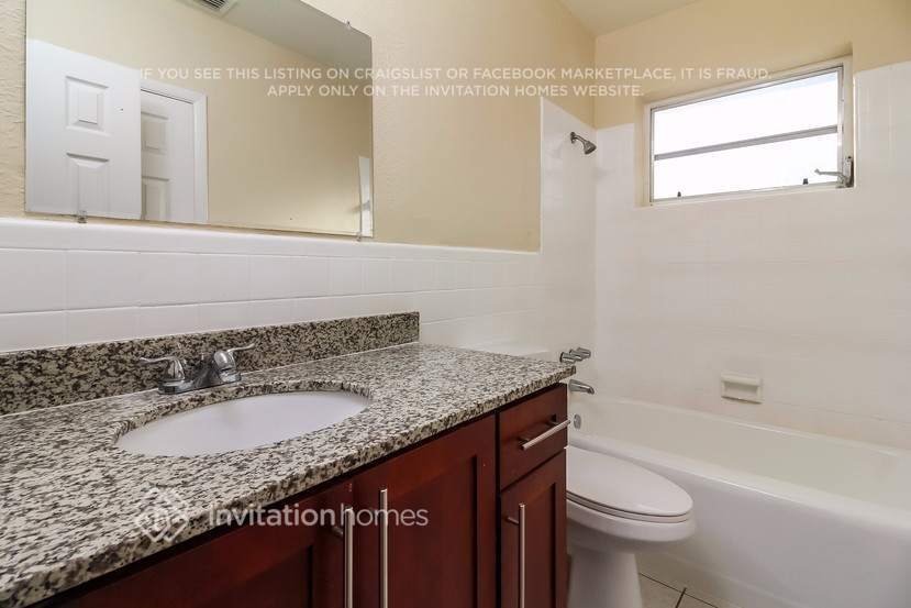 Building Photo - 5660 W 9th Ct