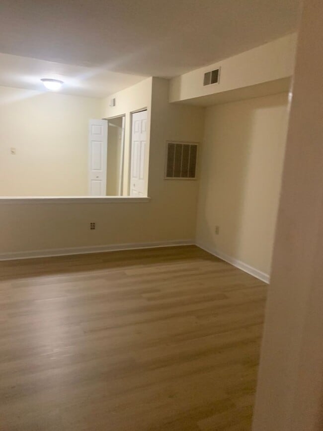 Building Photo - ONE LEVEL CONDO NEAR REX HOSPITAL -Firepla...