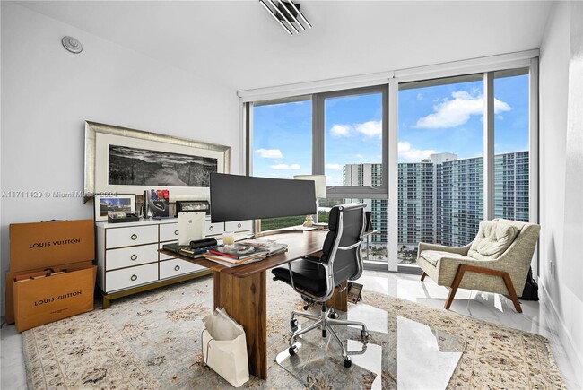 Building Photo - 15701 Collins Ave