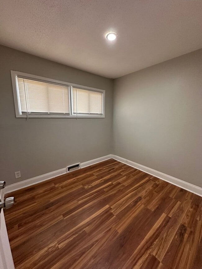 Building Photo - 4 bedrooms 1 Full bathroom. The house is very spacious living room, dining room and full kitchen ...