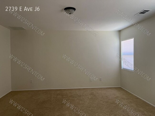 Building Photo - 2739 E Ave J6