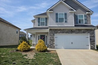Building Photo - Get ready to fall in love—this sleek, modern beauty in West Creek Farms is bringing the wow facto...