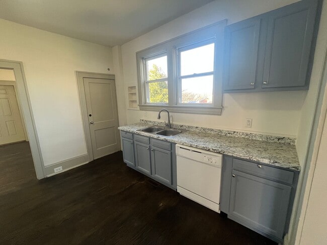 Building Photo - Spacious 4-Bedroom, 2-Bath Home with Porches & Basement