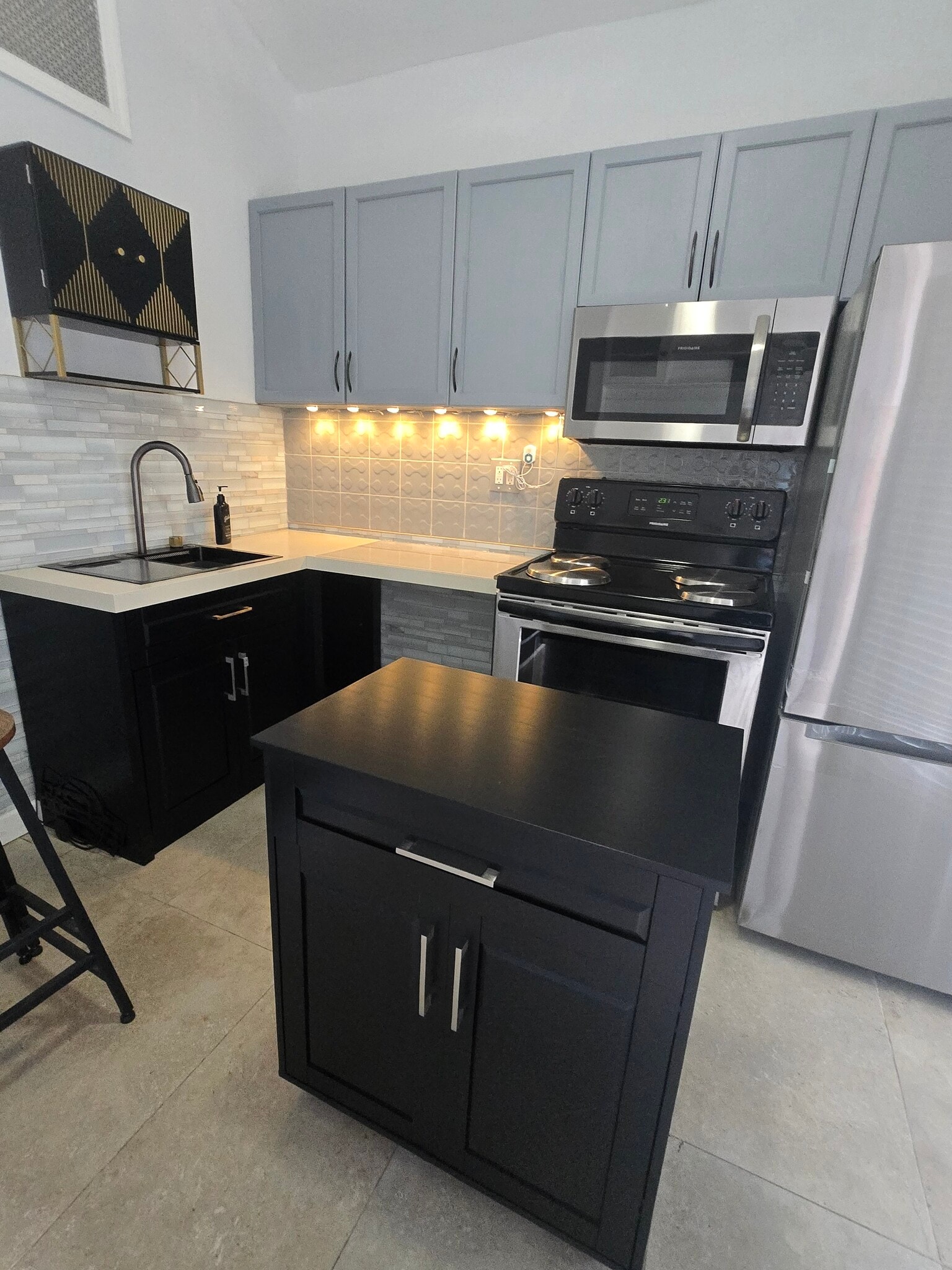 Movable island stored between stove and sink when not in use - 3115 54th Ave N