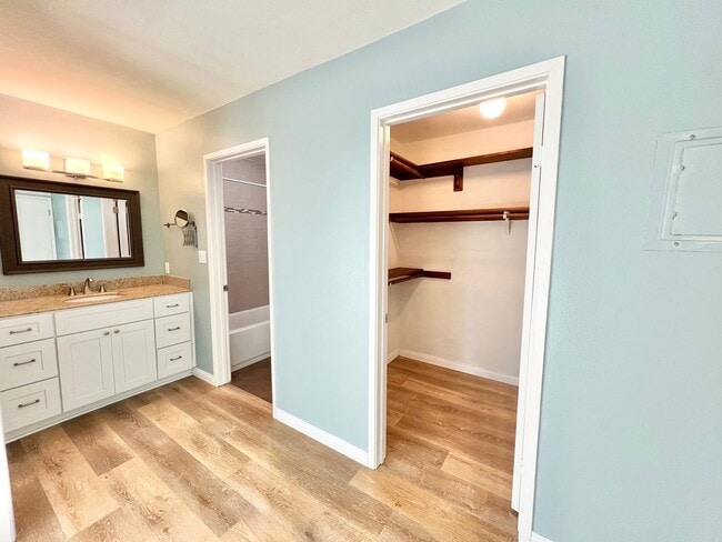 Building Photo - Contemporary 2 Bed Condo with 2 Garage Parking Spaces, Community Pool, and 3 Private Balconies