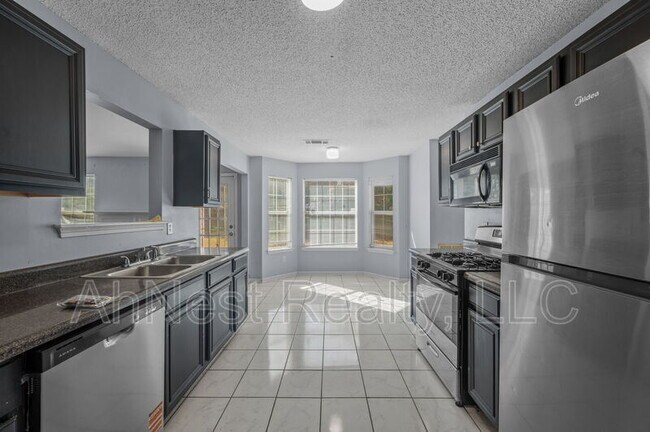 Building Photo - 7227 Teakwood Pl